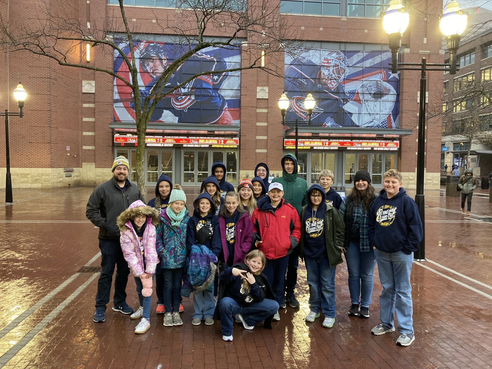 The grades 5-8 Student Council poses for a group picture outside the Columbus Blue Jackets home, Nationwide Arena, on Student Leadership Day.
