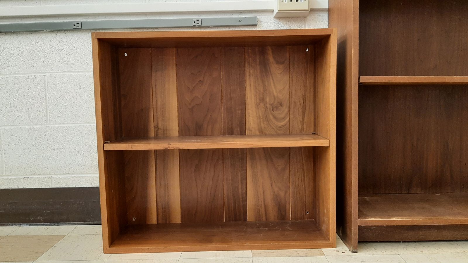 An image of a 2-shelf wood bookcase.