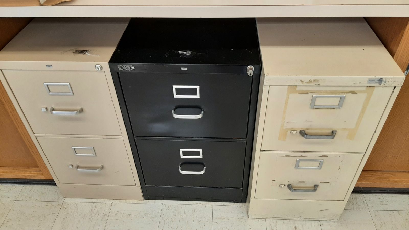 An image of three 2-drawer filing cabinets.