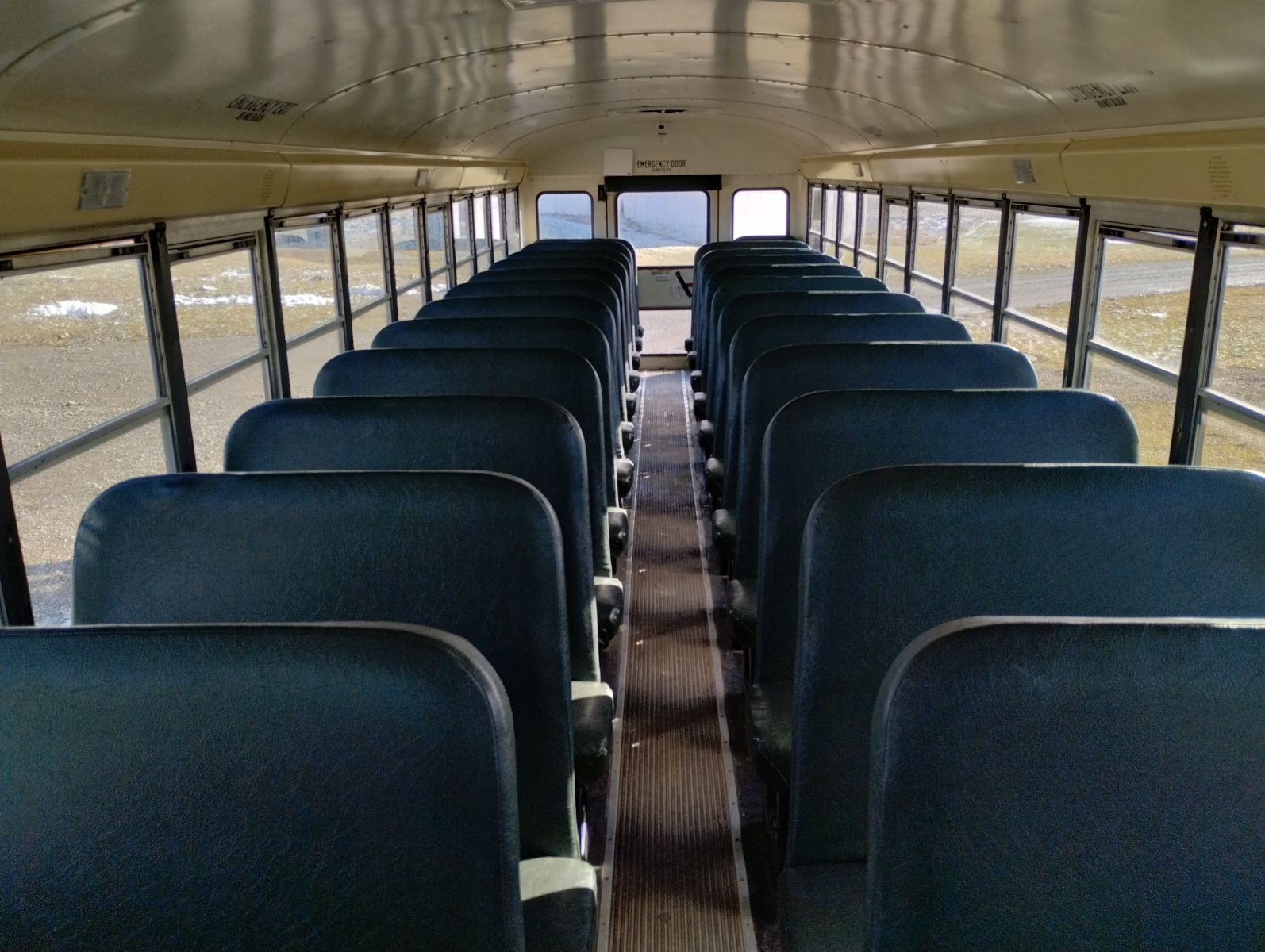 An image of the seating in a school bus.
