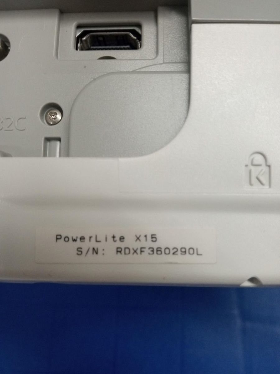 An image of the model and serial number of an Epson data projector.