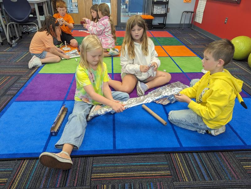 An image of students working together.