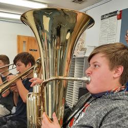 A student plays the tuba.