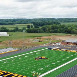The field and track at the new stadium are ready for competition.
