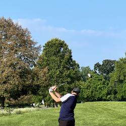 A golfer plays the course.