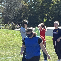 A student participates in the clothing relay.
