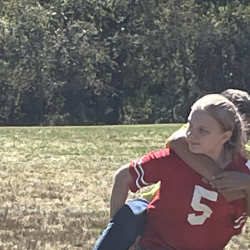 Students participate in the piggyback relay.