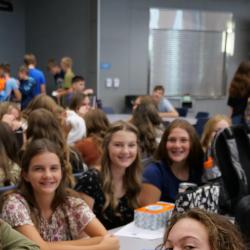 An image of students sitting in the cafeteria.