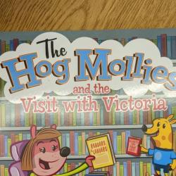 The book cover for "The Hog Mollies and the Visit with Victoria"
